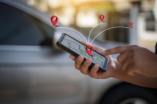 Premium Photo _ A man makes use of GPS and the internet online map in the car controls the navigator for GPS tracking